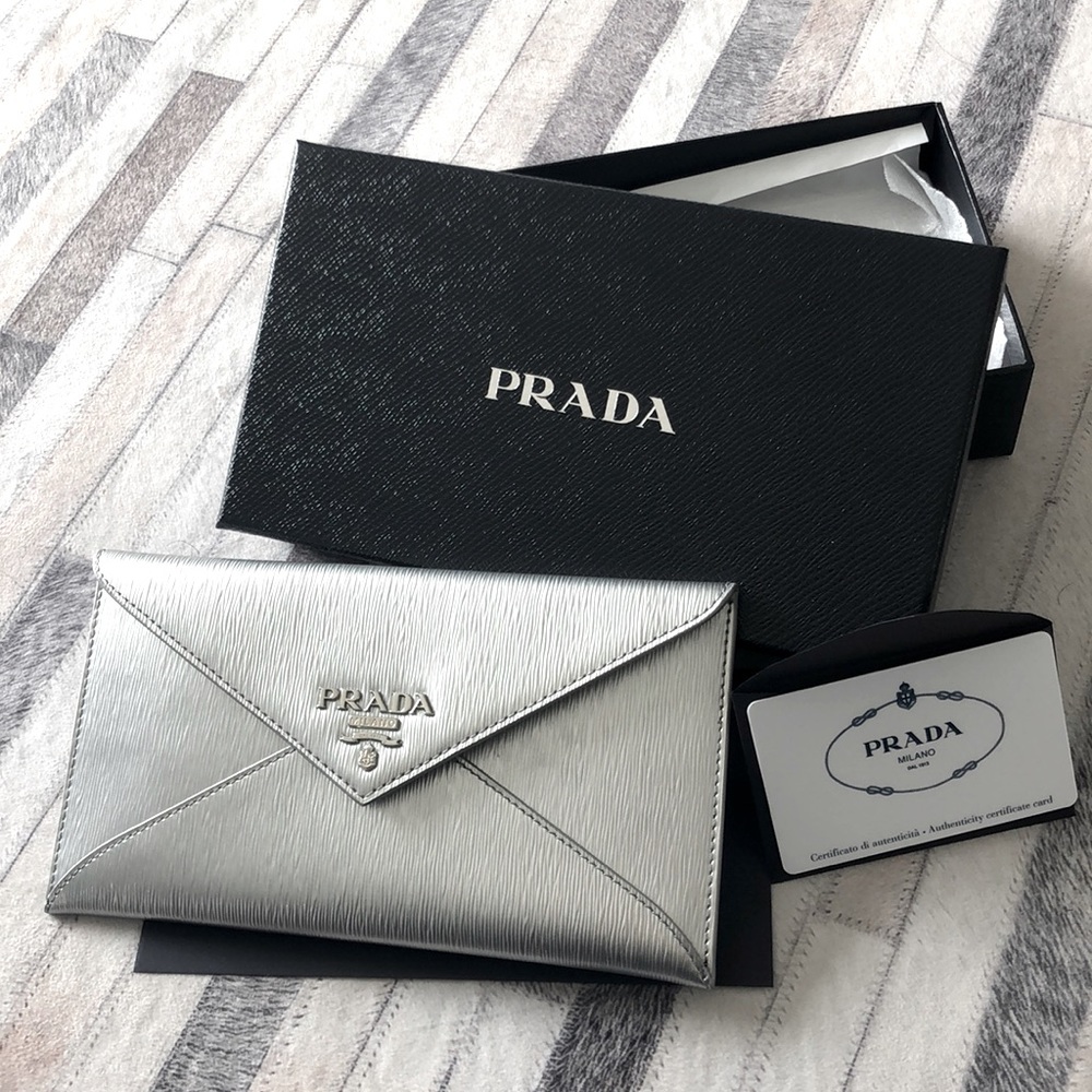 Silver envelope clutch NWT